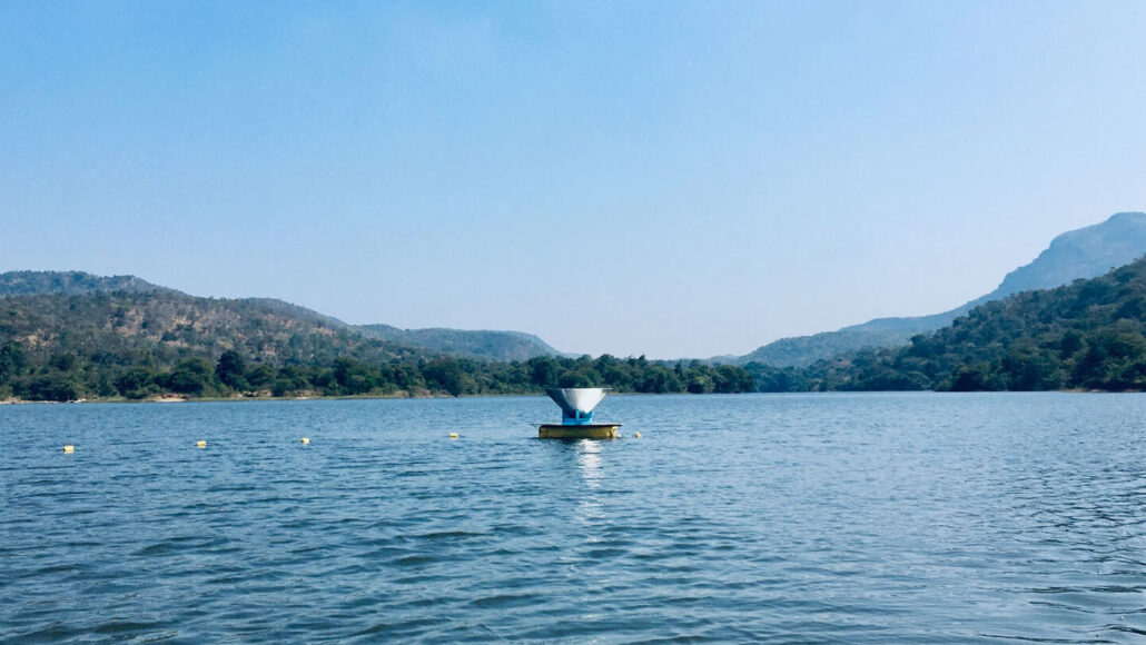 photo of an antenna on a raft floating on a lake in India