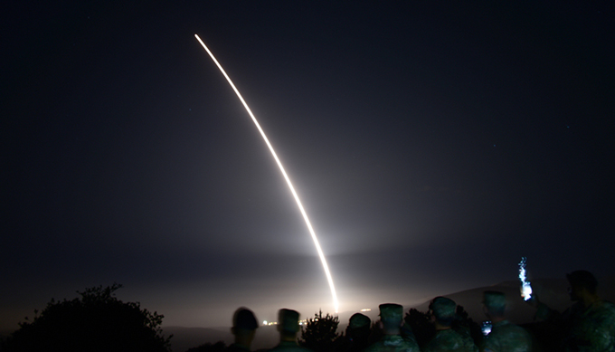 photo showing a streak of light produced by an unarmed Minuteman III missile launched from Vandenberg Space Force Base in California