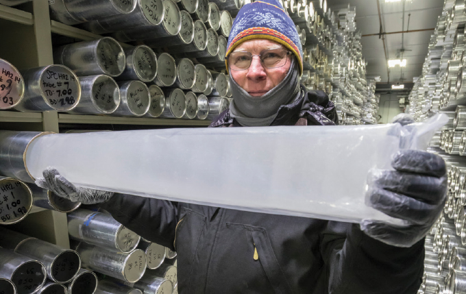 photo of Geoffrey Hargreaves holding an ice core