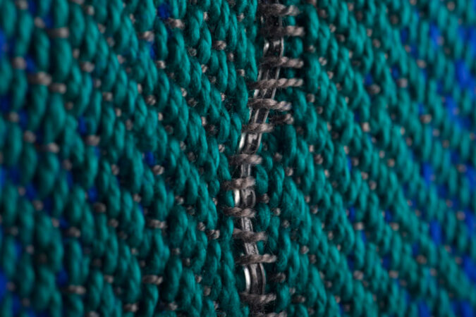 image of special fiber woven into blue and green fabric