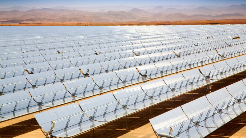 A solar thermal power plant in Morocco, with long rows of solar panels