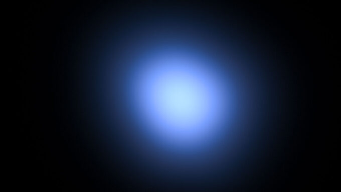 image of an object glowing blue from Cerenkov light