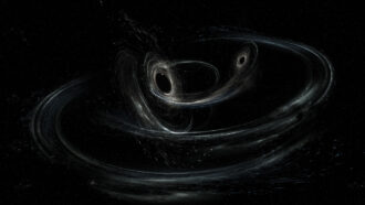 an illustration of two black holes merging