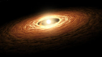 illustration of sunlight heating and evaporating the disk of gas and dust around a young star