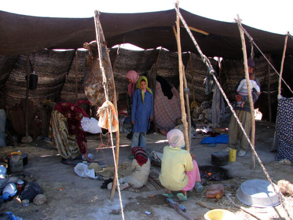 members of a nomadic community in a tent in Iran
