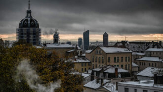 buildings of Lyon, France under a cloudy sky