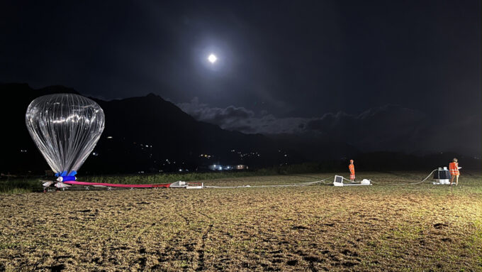 photo of an inflated balloon in a field before launch in the Seychelles