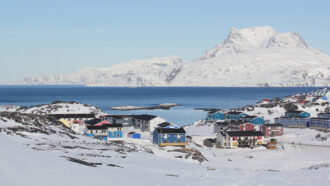 Buildings with mountains in the background in Nuuk, Greenland