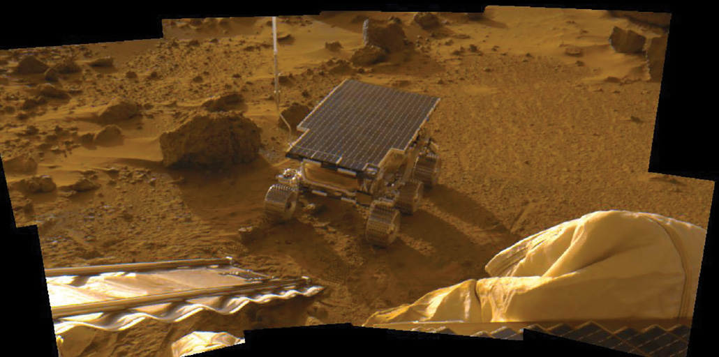 photo of the Sojourner rover with its landing ramp in the foreground