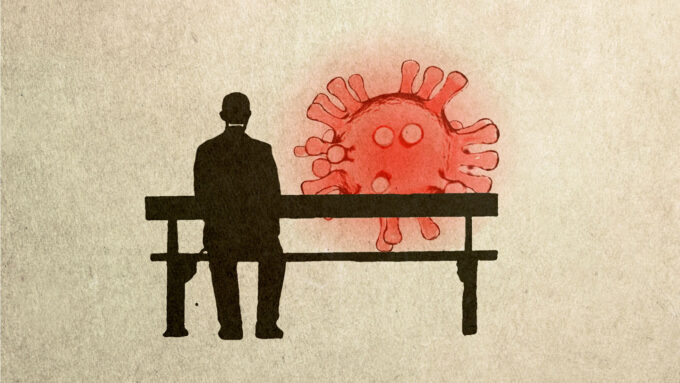 Black silhouette of a man on a parkbench with an illustration of a pink coronavirussen seated next to him.