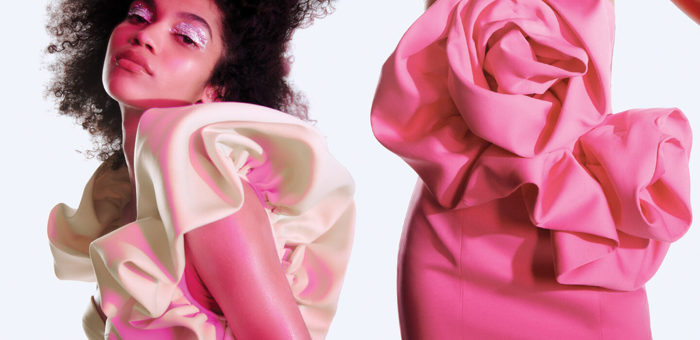 photo of models wearing pink and white Zara dresses where one model's face looks to the camera and the torso of another model is visible