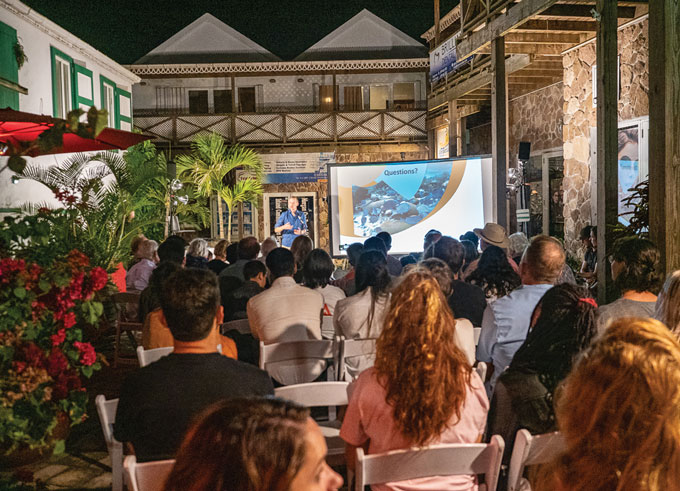 Alwyn Hylkema talks about sea urchins to a crowd on Saba island