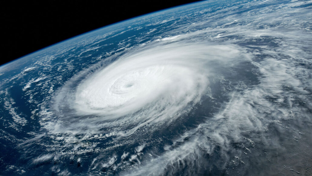 Photo of Typhoon Hinnamnor from space as it swirls in the western Pacific Ocean.