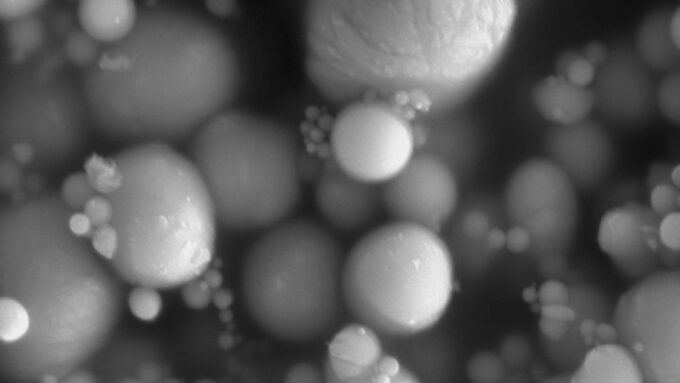 A microscope image of the nanoscopic balls on a black background