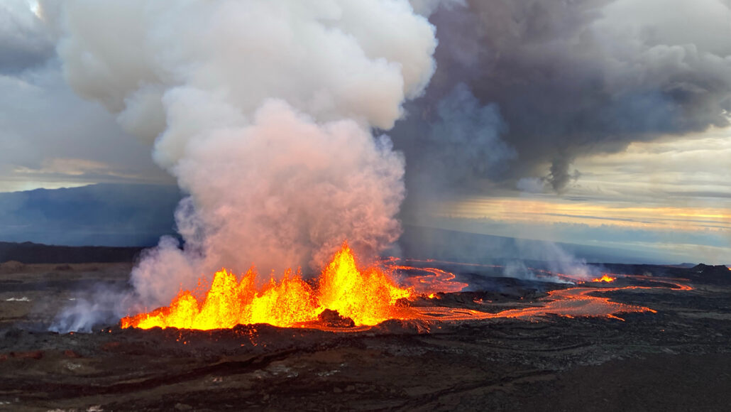 Lava spewing from a fissure with smoke rising