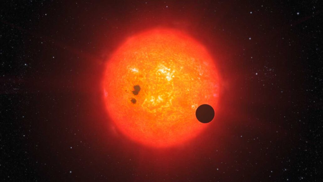 An illustration of exoplanet GJ 1214b and its star.