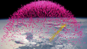 image of pink dots representing Gamma Rays passing through Earth's atmosphere