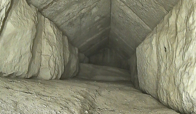 A narrow, empty passage within the Great Pyramid