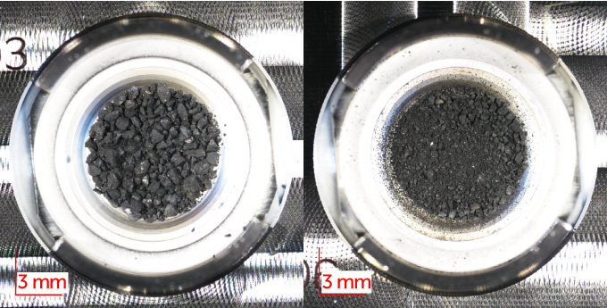 Two side-by-side photos showing two samples taken from the asteroid Ryugu.  The sample on the left is a collection of small black rocks sitting in the center of a white circle while the sample on the right is a collection of smaller rocks and particles in the center of a white circle.