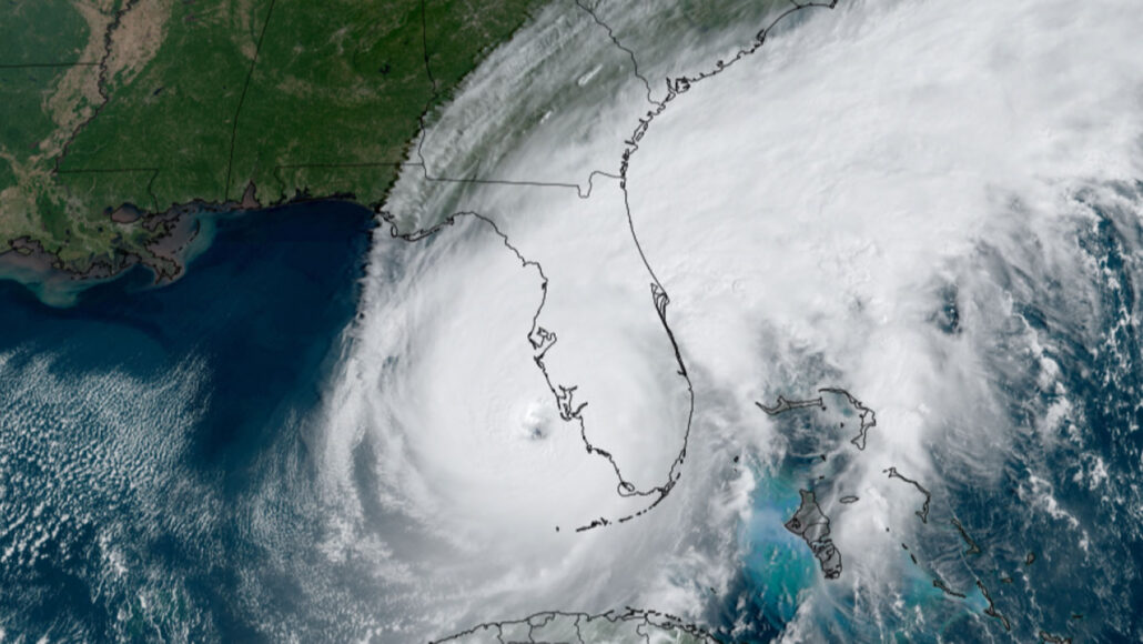 A satellite image of Hurricane Ian with its eye just west of Florida