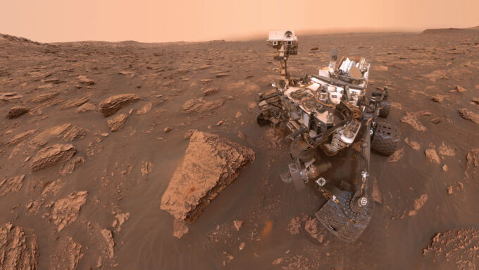 A photo of NASA's curiosity rover on the surface of Mars.