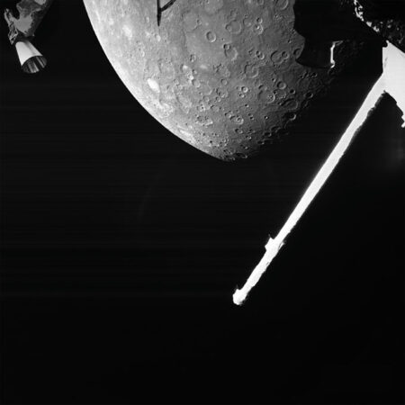 A photo of part of Mercury’s northern hemisphere taken by the BepiColombo probe parts of which are visible in the foreground.