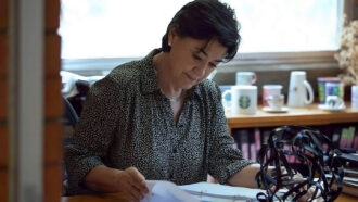A photo of Susana López Charretón studying rotaviruses at her desk.