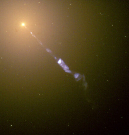 Composite picture of the galaxy M87 and its jet of fast-moving gas, taken from the Hubble Space Telescope.