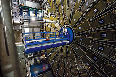 ATLAS is one of the massive laboratories surrounding the huge underground tunnel of the Large Hadron Collider. Protons speeding through the tunnel will collide here, and ATLAS will detect what happens.