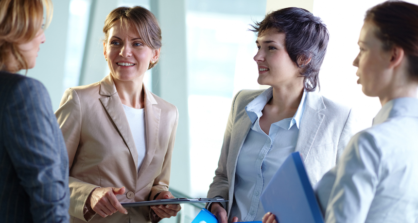 businesswomen talking