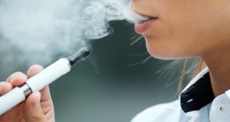 person smoking e-cigarette