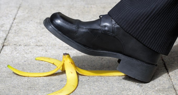 man about to step on a banana peel