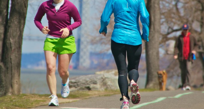 two runners on a path