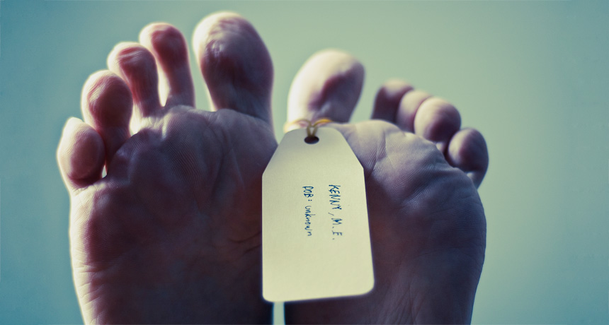 feet with toe tag