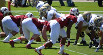 football players at the line
