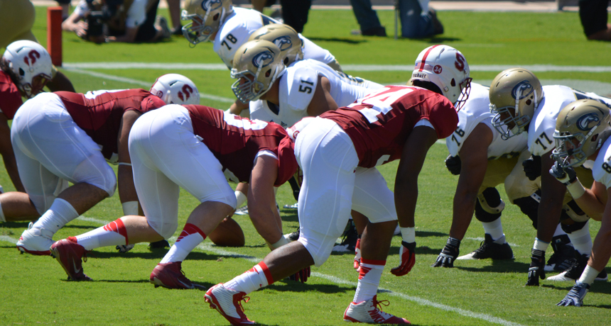 football players at the line