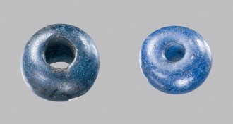 two cobalt-blue glass beads