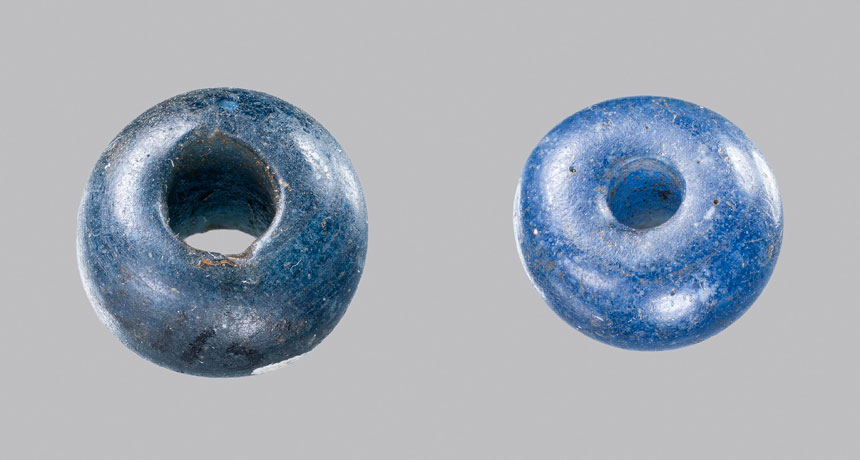 two cobalt-blue glass beads