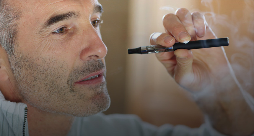 Man vaping with e-cigarette