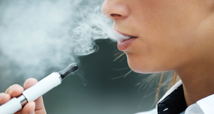 someone smoking an e-cigarette