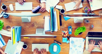 people working around a table