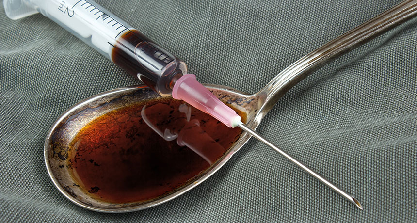 heroin in spoon with needle