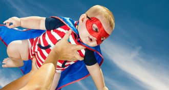 baby in a superhero costume