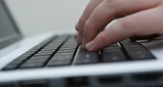 Hands on a keyboard