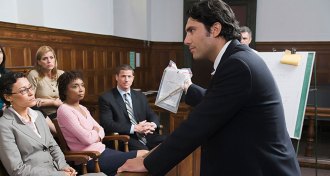 lawyer presenting evidence to a jury