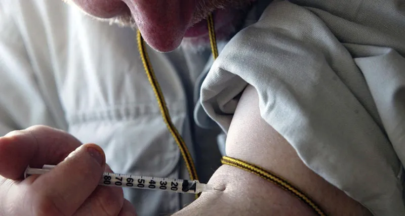 a person shooting up