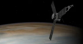 illustration of Juno spacecraft in orbit around Jupiter