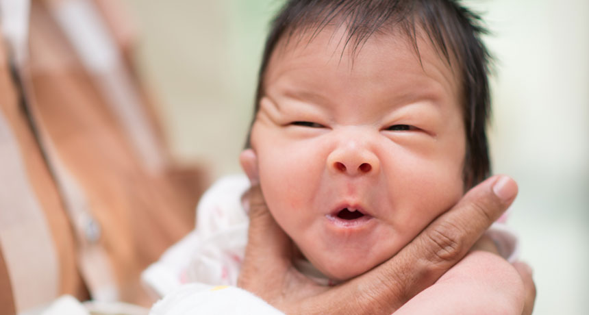 infant getting burped