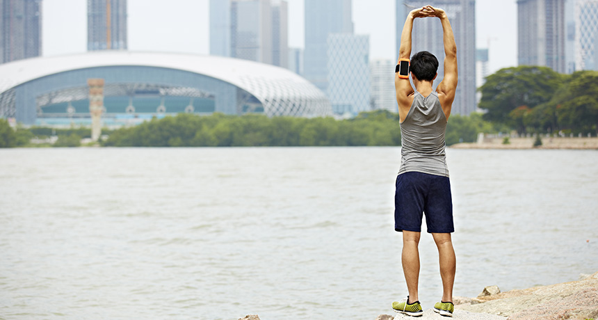 Jogger with fitness tracker