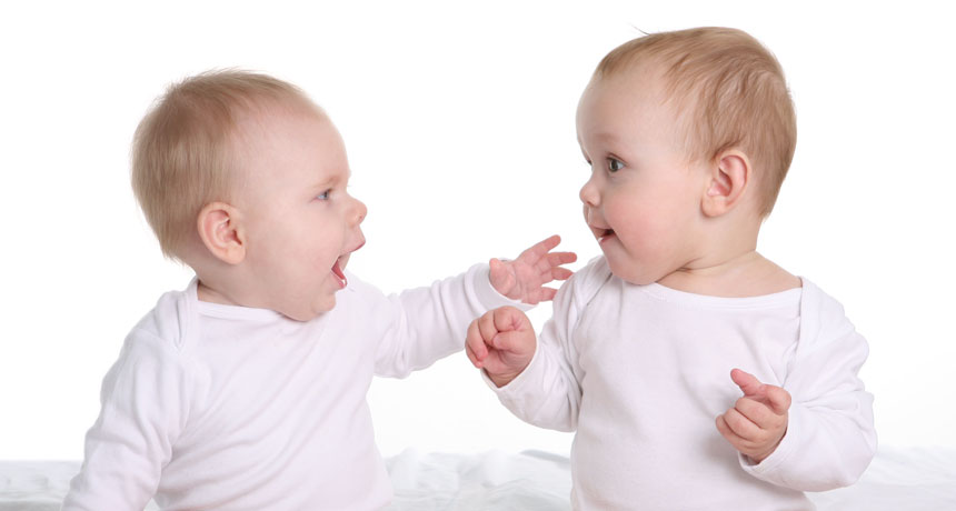 two babies chatting